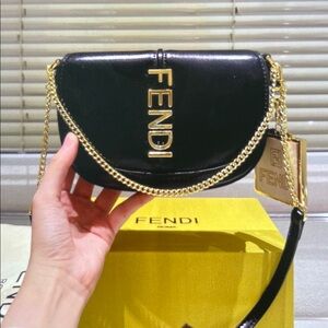 Fendi Black and Gold Leather Bag